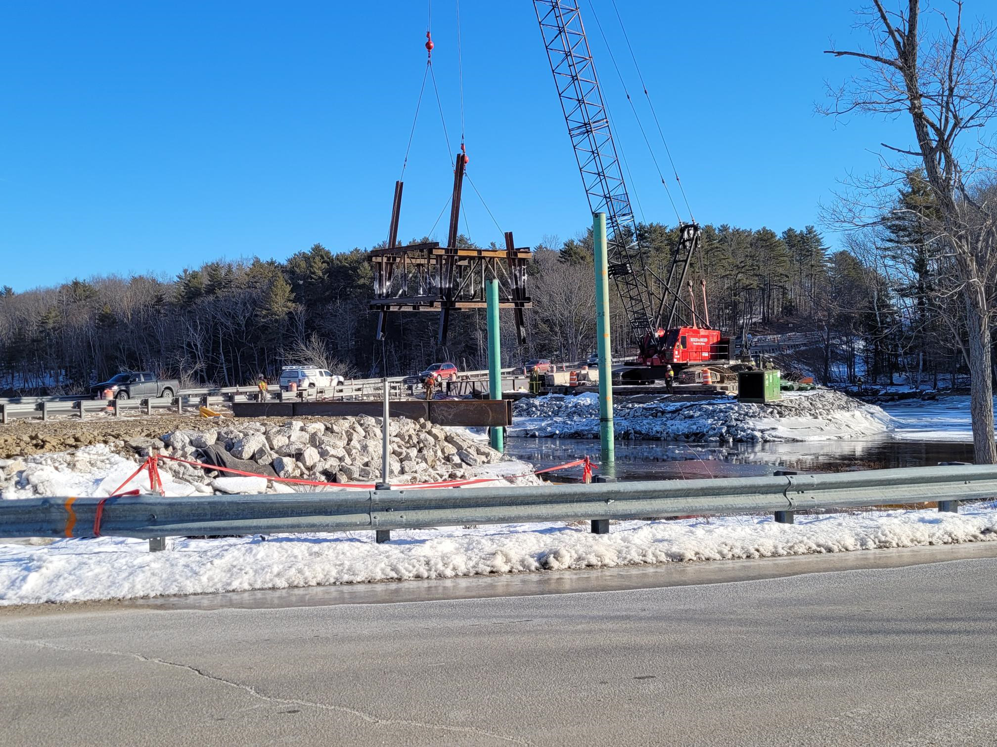 Looking from George Wright Rd at installation of piles for temporary pile bent pier #2 for the temporary Pleasant Cove bridge.